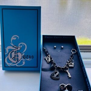NWT. Guess. Silver and Black Charm Jewelry Set. Dark Princess.